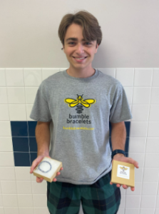 Senior JP Mackey and his “Busy Bee” bracelet design
