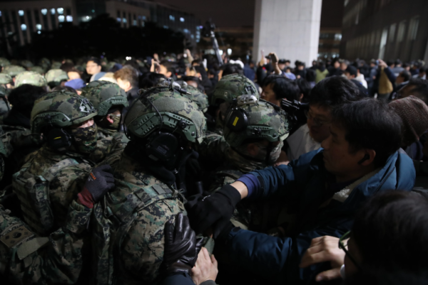 South Korean soldiers attempt to enter the national assembly building on December 4, 2024 in Seoul, South Korea.
Chung Sung-Jun/Getty Images
